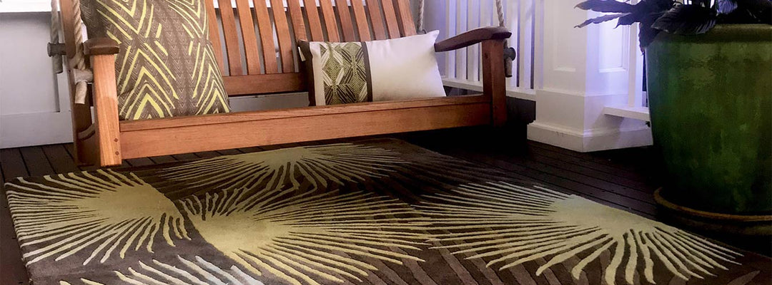 Coastal Area Rugs Displaying the Loulu Hawaiian Print Design in an Outdoor Living Area