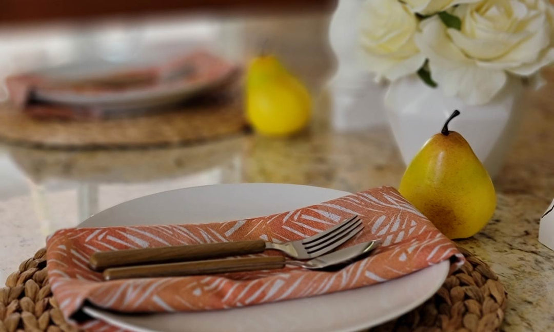 Coastal Dining Room Decor Dinner Plate Utensils on a Woven Mat