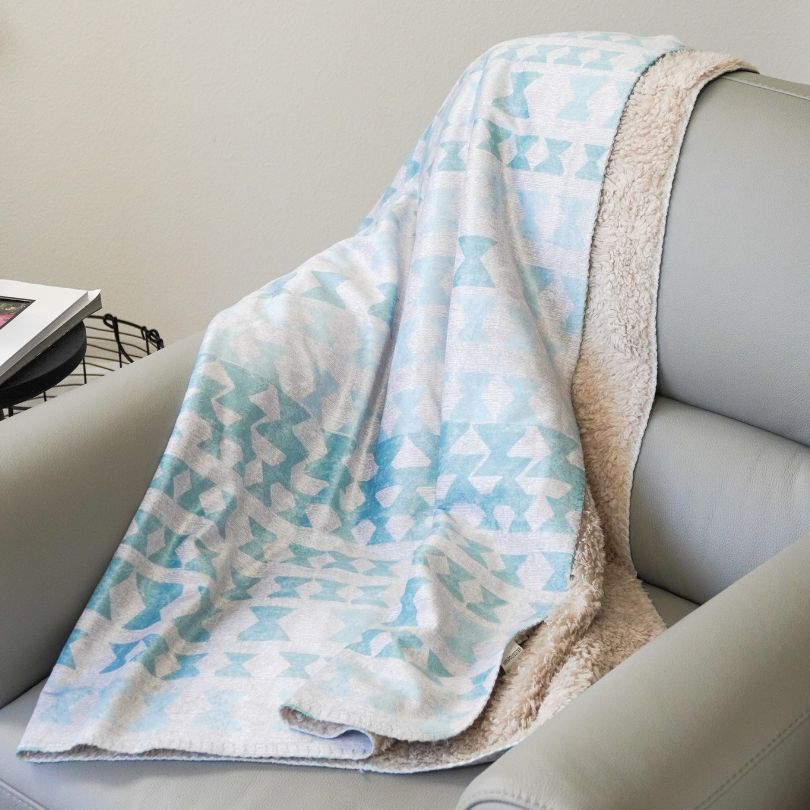 Kapili cozy throw draped over a chair