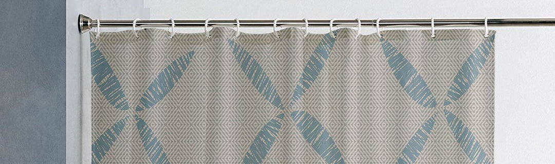Coastal Shower Curtains Kāpua Kai Print with colors Light Blue and Taupe in a Sunlit Bathing Area