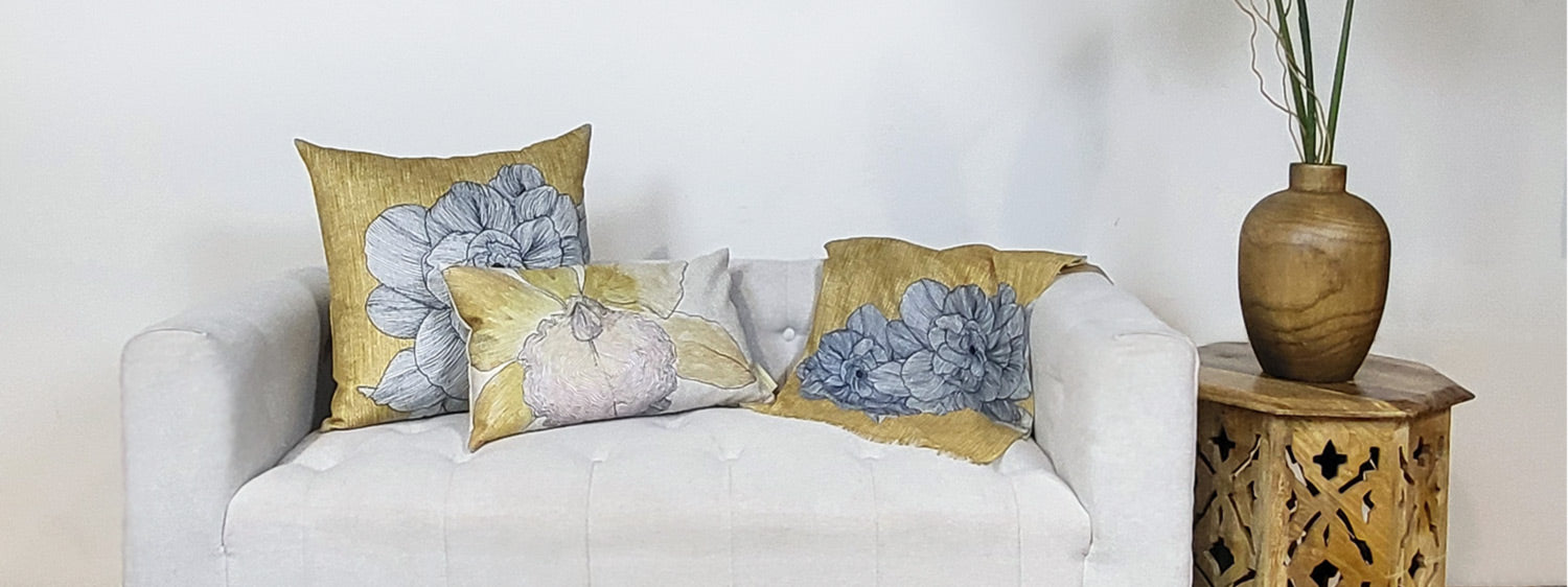 Legacy of Aloha Collection Designed by Melveen Leed Floral Decor Pillows on Couch