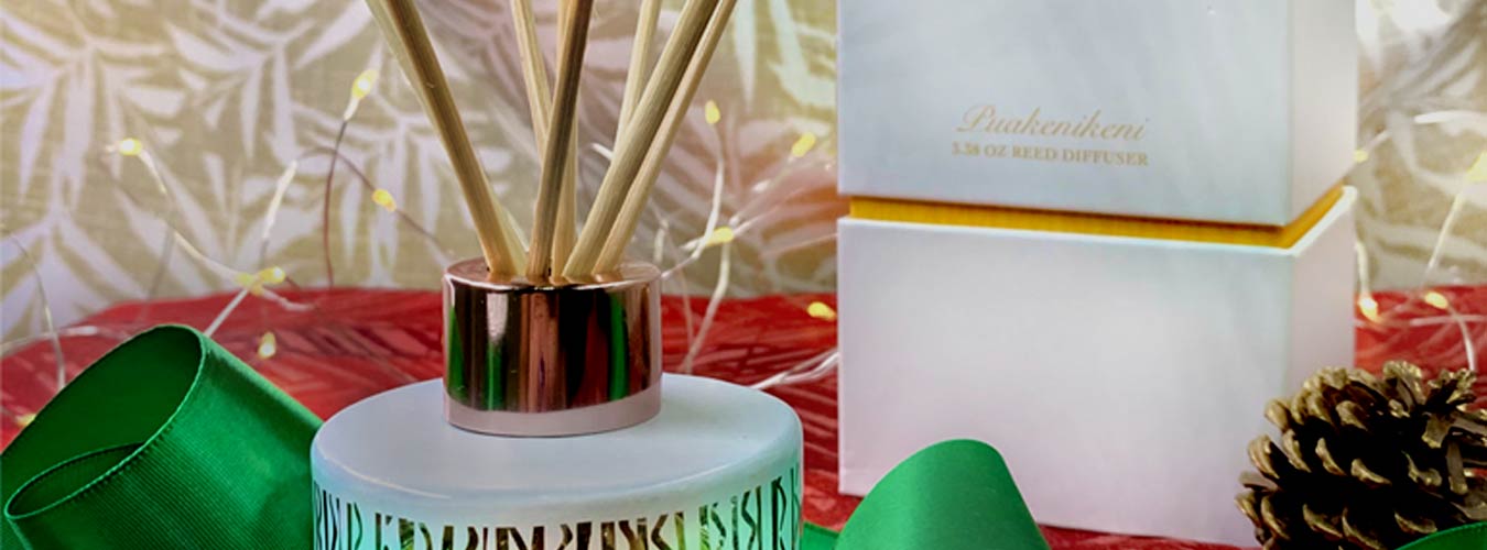 Reed Diffusers On Display and In Box Showcasing the Pua Polynesian Flower 