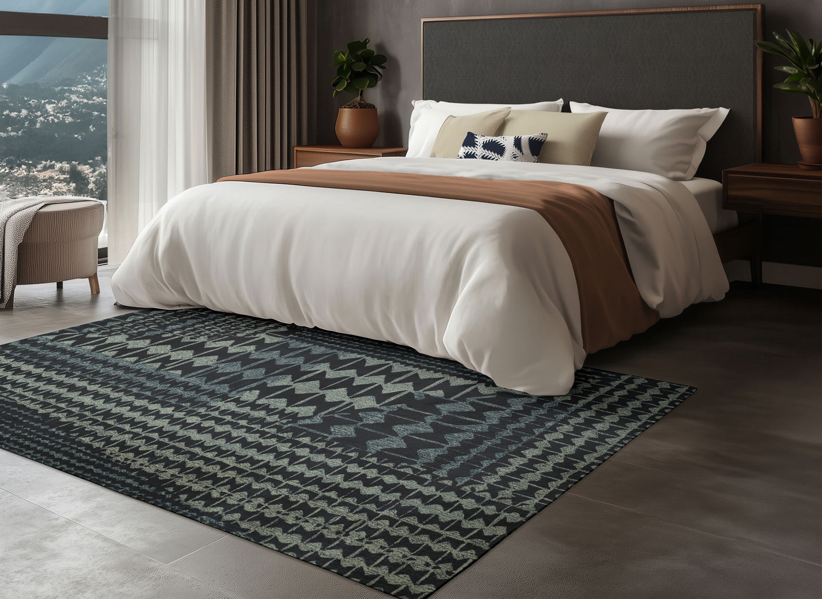 staged room with Kapili charcoal Hawaiian rug in navy and cream tones