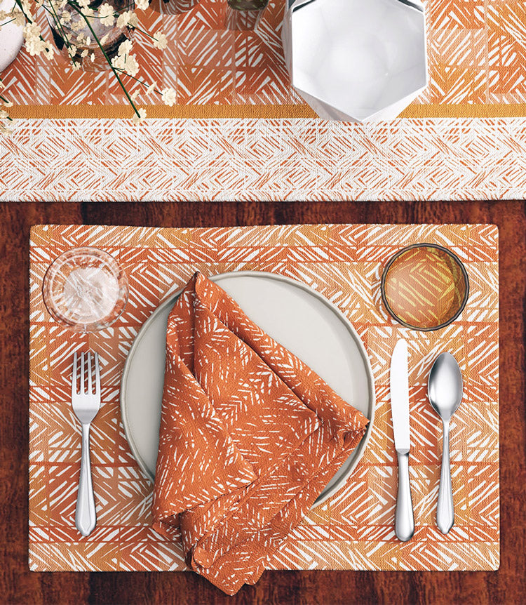 Orange and Brown Colored Hawaiian Placemats and Table Runner Shown n a Dining Table