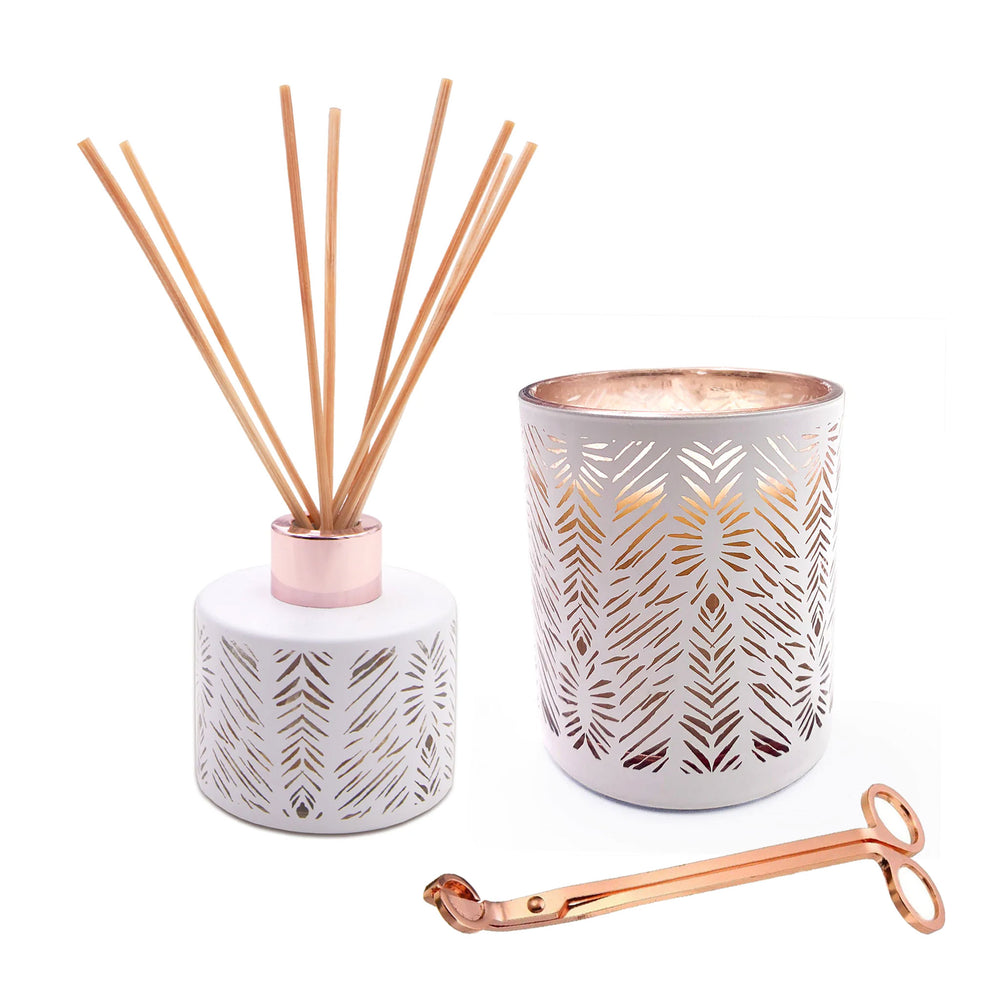 pikake scented diffuser and candle plus rose gold wick trimmer on white background