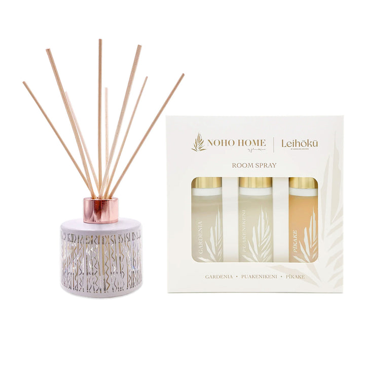 puakenikeni scented diffuser and a three-pack of room sprays on white background