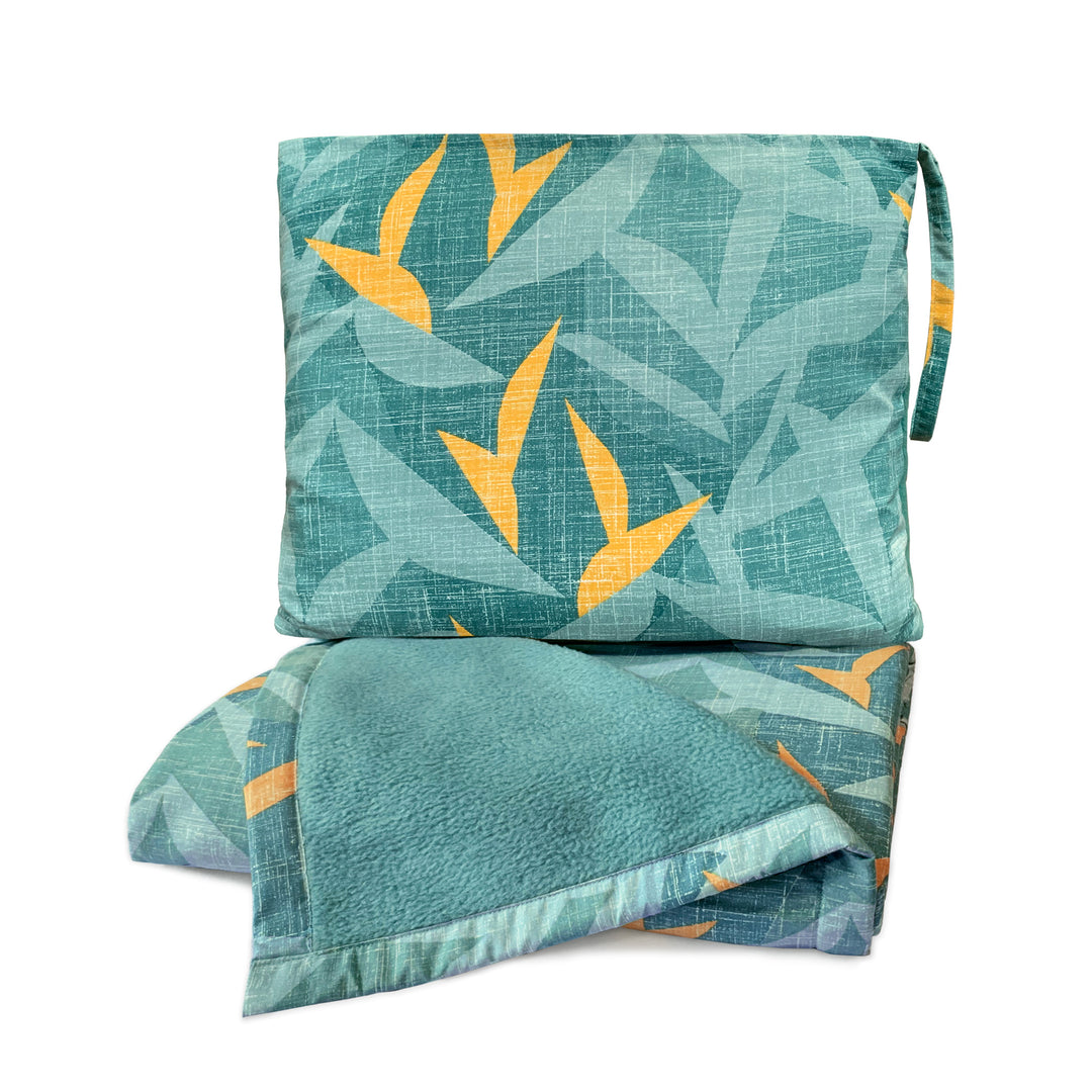 Hawaiian Airlines NOHO HOME travel blanket in teal on white background