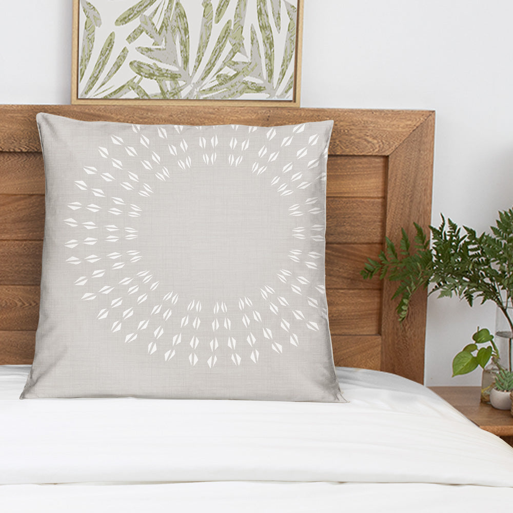 Pukana Lā Euro Sham Pillow On a Bed With a Wood Headboard