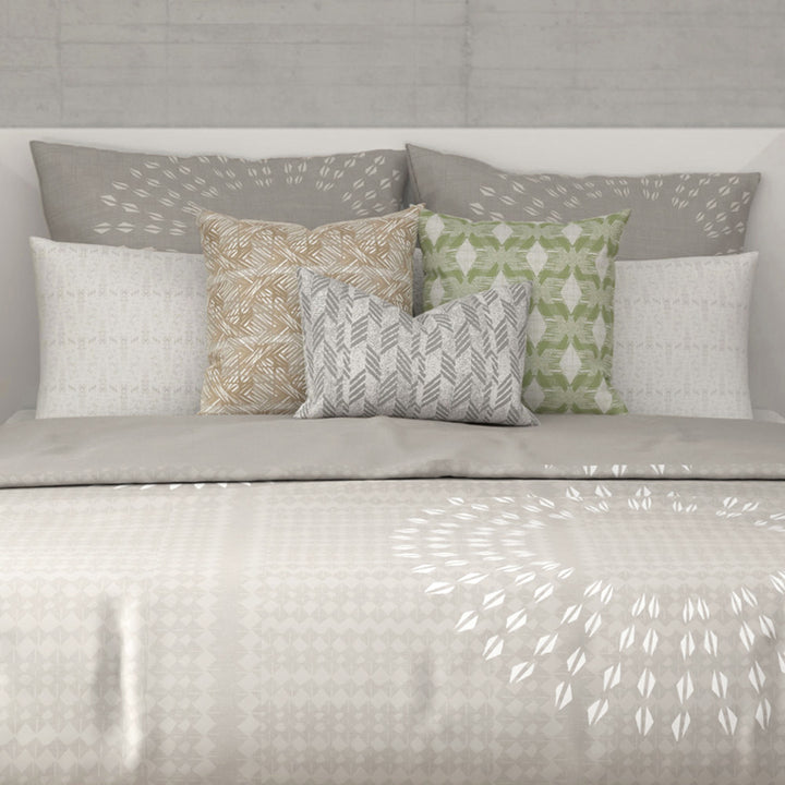 Closeup Of Halawai Comforter Shown on a Queen Size Bed With Decor Pillows on Top