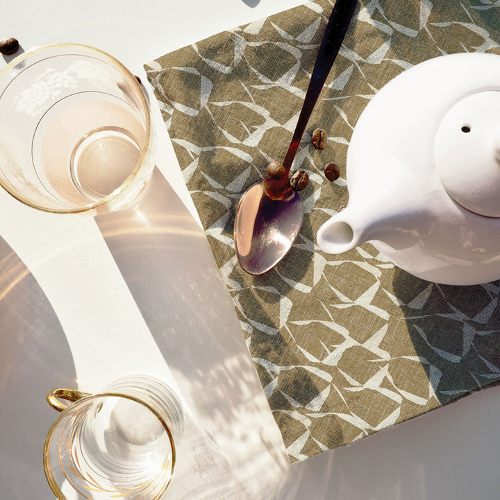 Premium ʻEke Dining Napkin Under a Spoon With Coffee Beans and Teapot