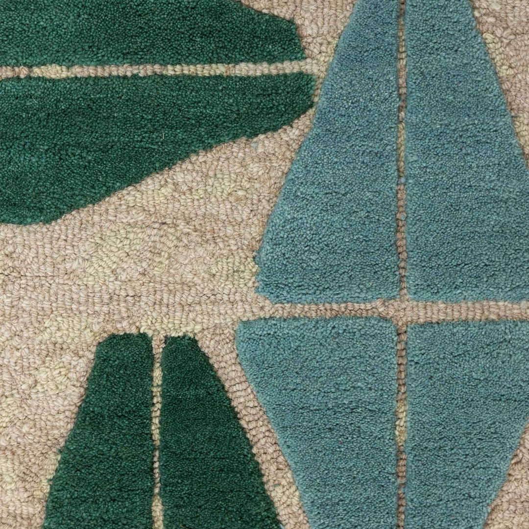 Close Up View of the Teal Color Kinona Area Rug Geometric Shapes Hawaiian Design