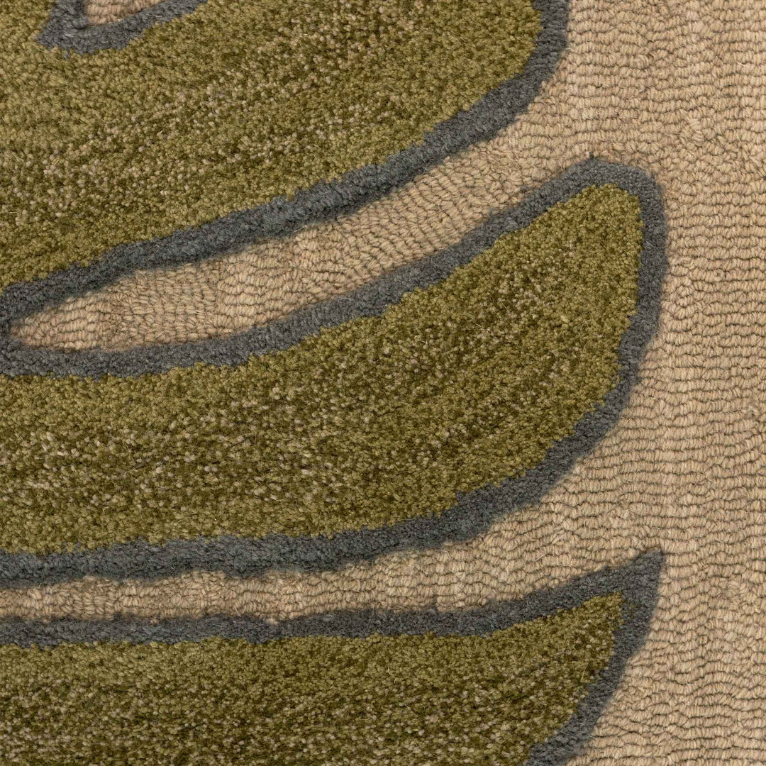 Close Up of the Taupe Color Deliciosa Plant Monstera  Hawaiian Rug Design