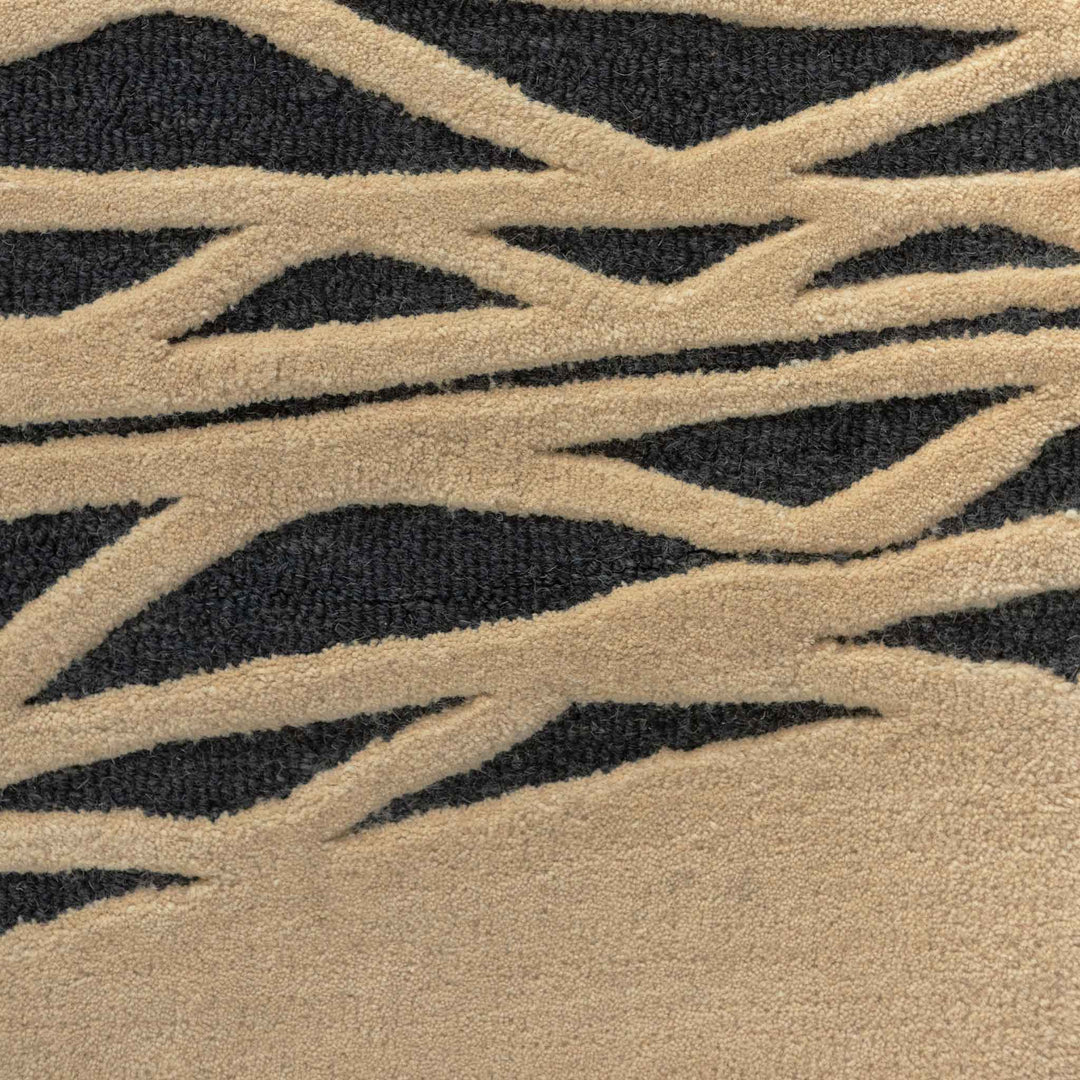 Close Up of the Charcaol Color Niho Kila Area Rug Hawaiian Design