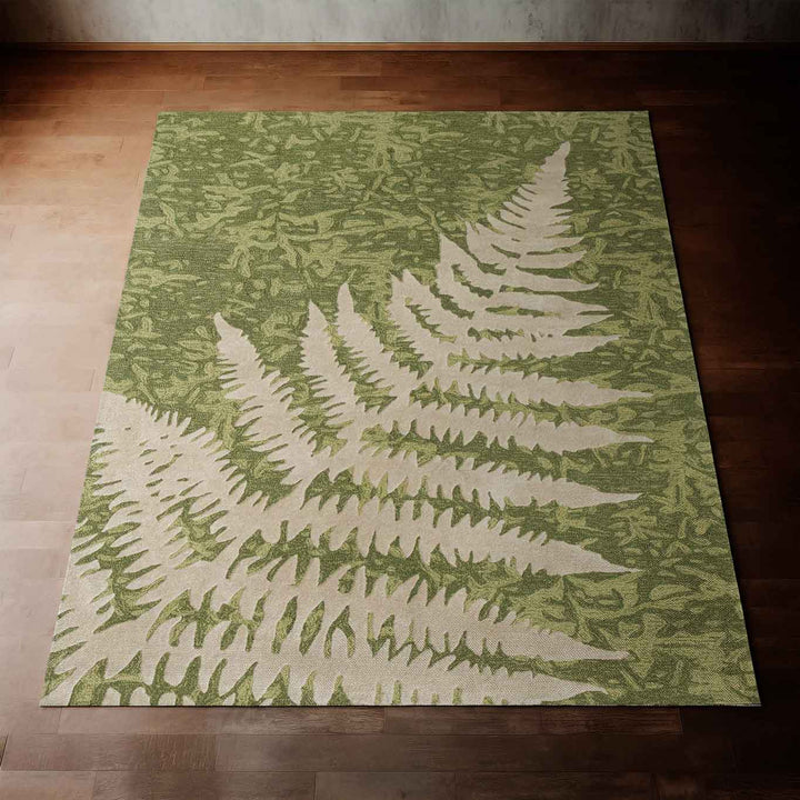 Stunning Green Palapalai Coastal Area Rug Laying on a Hardwood Floor With Sunlight