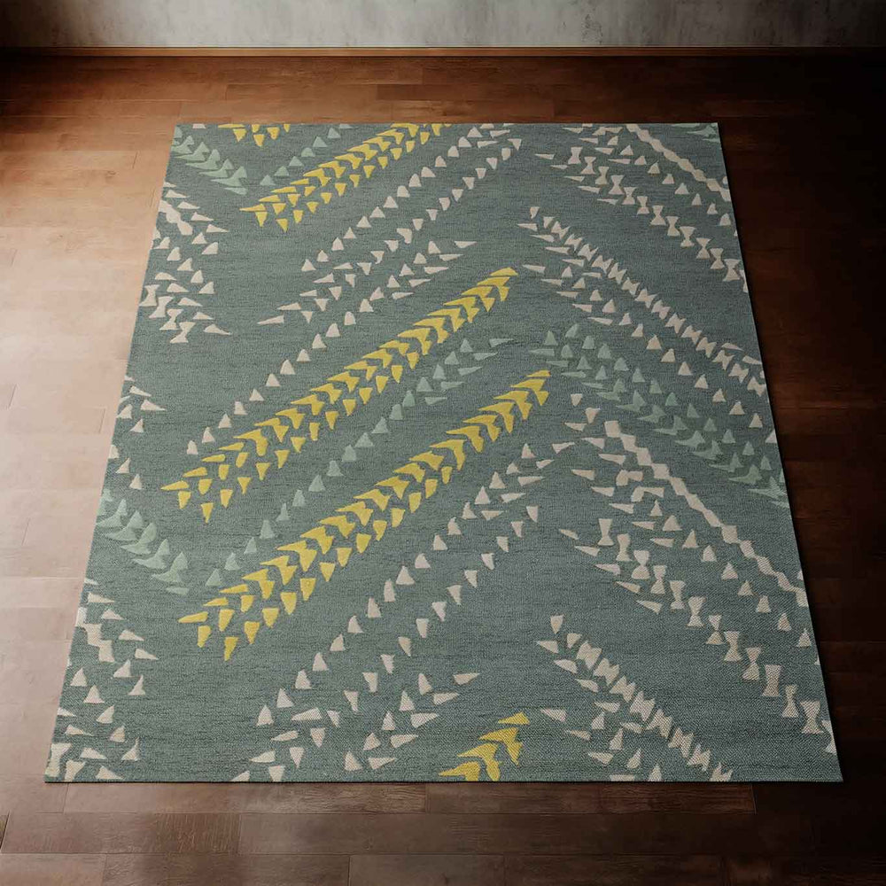 Kapa Area Rug Hawaiian Design in Teal and Hints of Tan Laid Out on a Wooden Floor