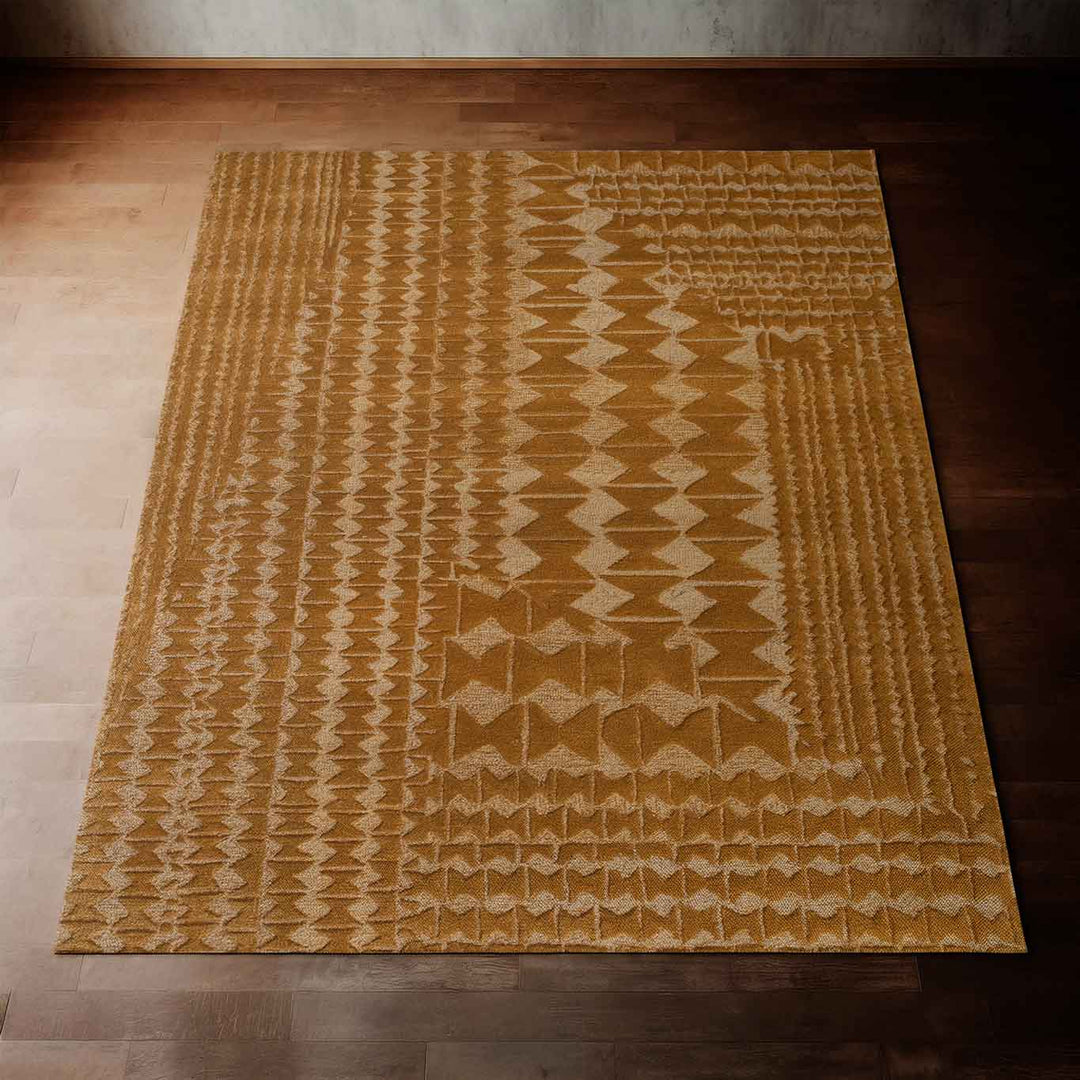 Eye Catching Bronze and Tan Kāpili Area Rug Laying on the Floor With Sunlight 