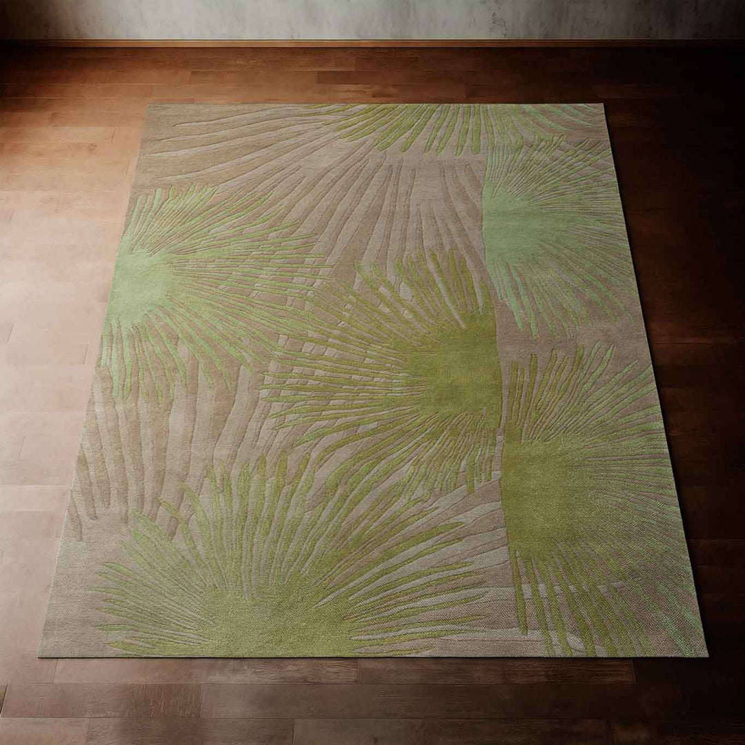 Stunning Green and Tan Loulu Area Rug Shown on a Hardwood Floor With Sunlight