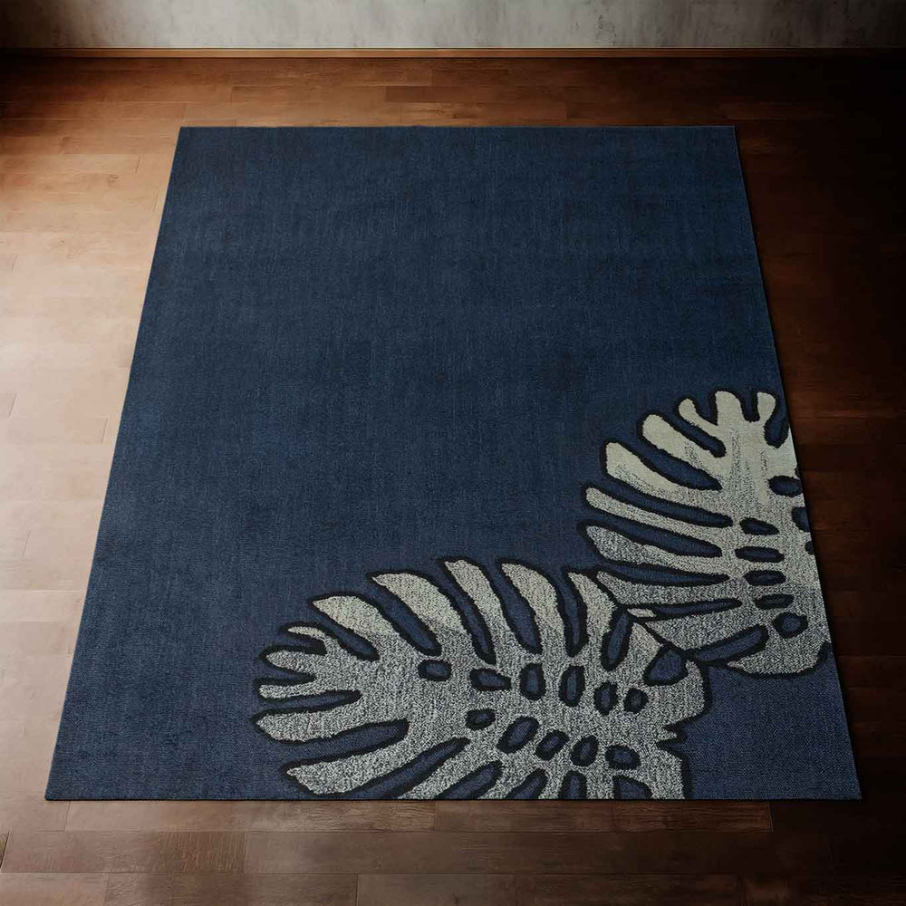 Eye Catching Navy Blue Monstera Area Rug Hawaiian Print on a Wood Floor