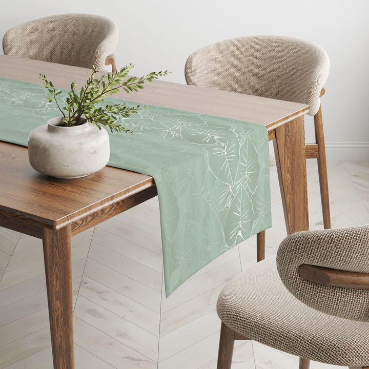 Hānai premium table runner in sage close up on table