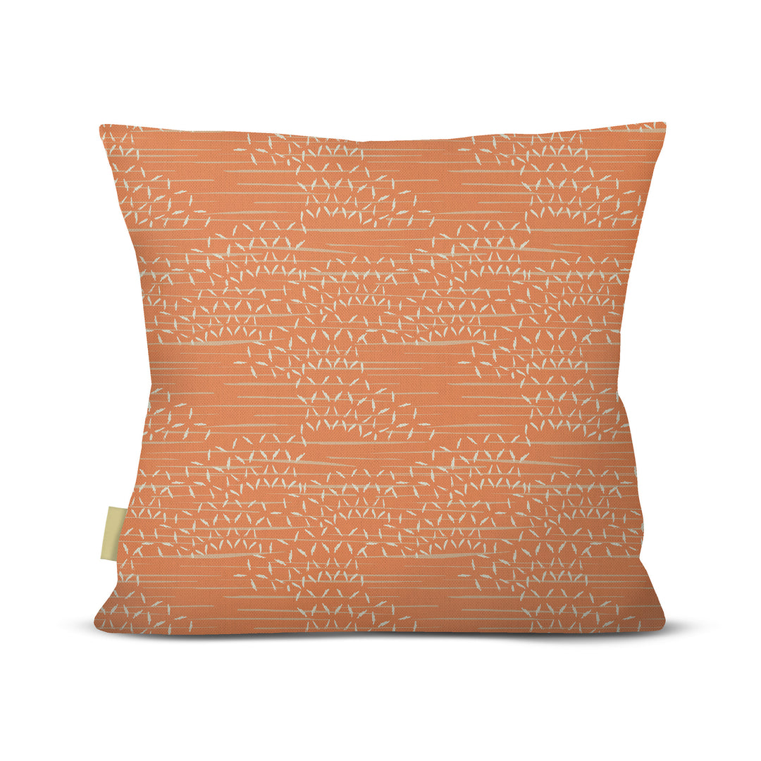 back view of Kaha square pillow in orange on white background