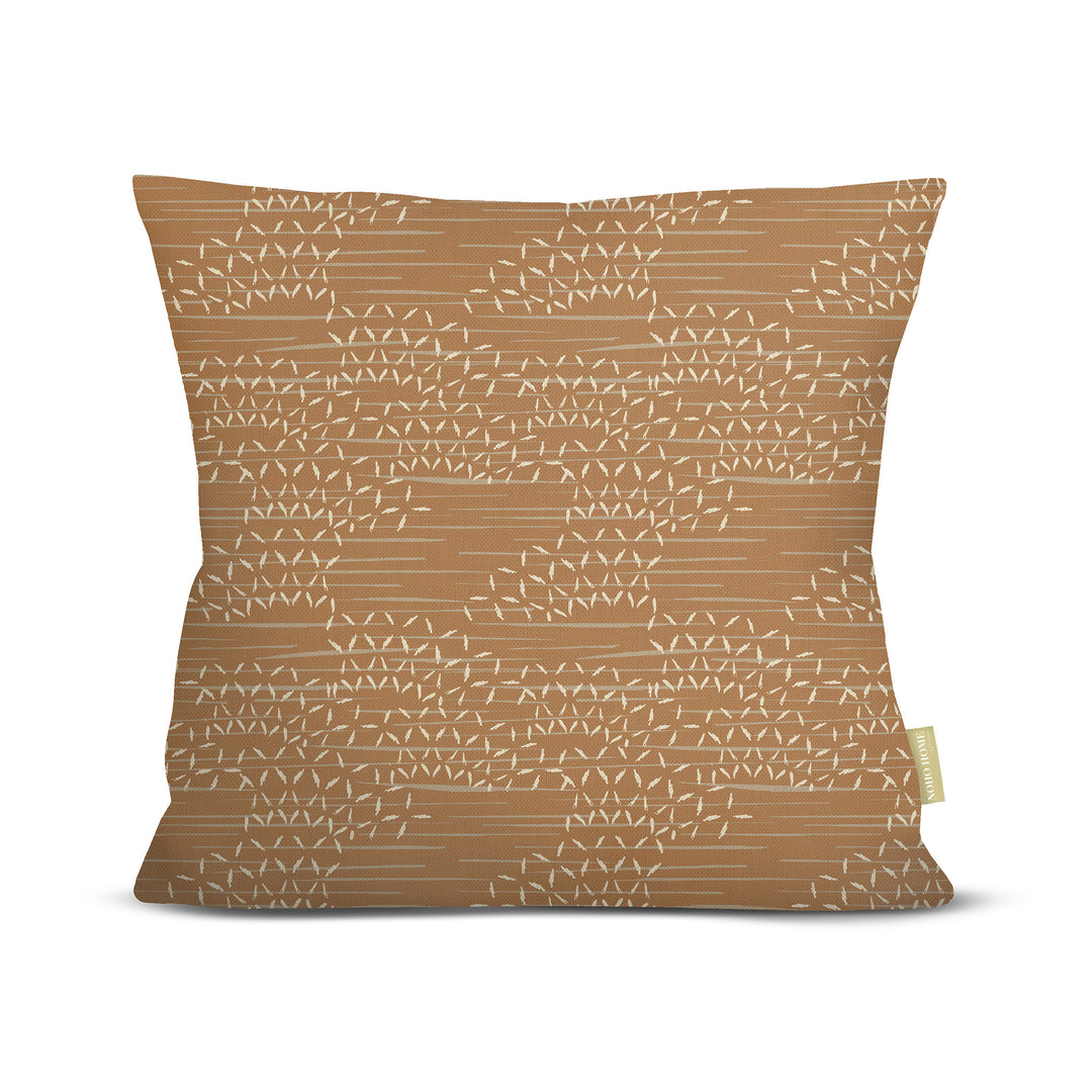 front view of Kaha square pillow in earth on white background