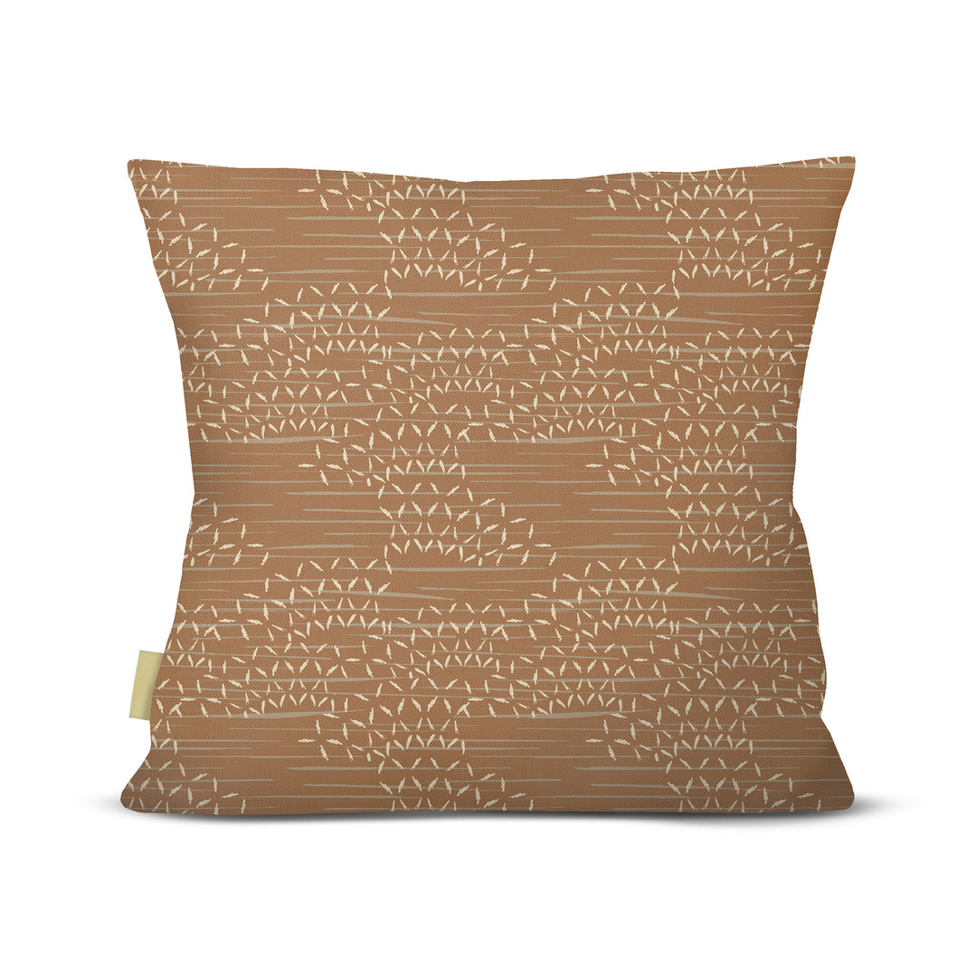 back view of Kaha square pillow in earth on white background
