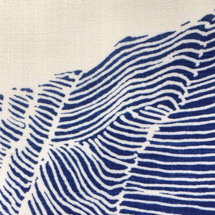 Close-up of blue and white wavy pattern on fabric