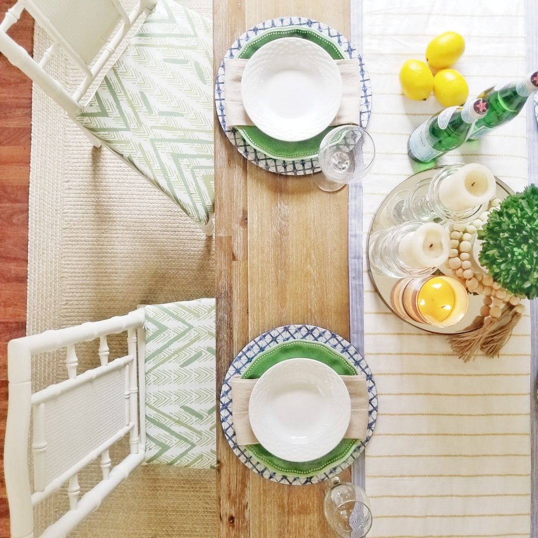 Aerial View of a Wooden Table Set With Hawaiian Printed Chairs
