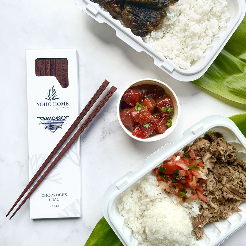 package of Tanioka's redwood limu chopsticks placed next to poke and food