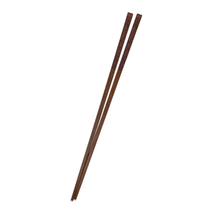 One Set of ʻAkahi Chopsticks On a White Background