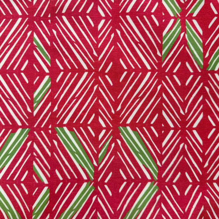 Close up of 'Akahi Red Green fabric
