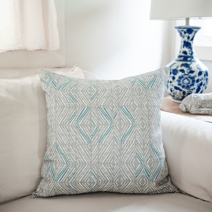 Snow & Frost  ʻAkahi Square Pillow Set Alone On a Couch