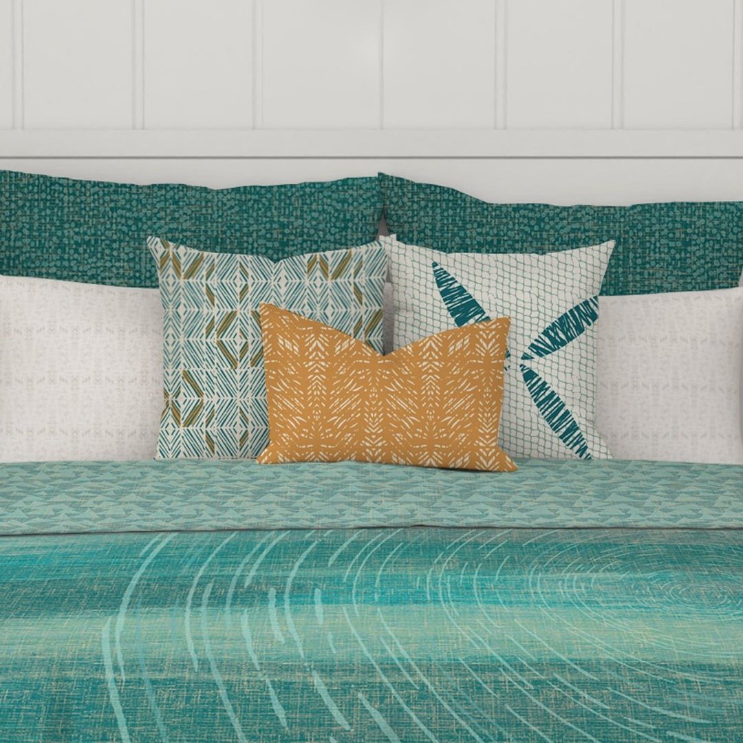 Orange Batik Lumbar Pillow Set On a King Size Bed