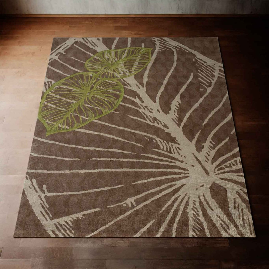 Stunning Kalo Area Rug With Its Dark Brown, Tan and Green Colors Laying on a Wood Floor