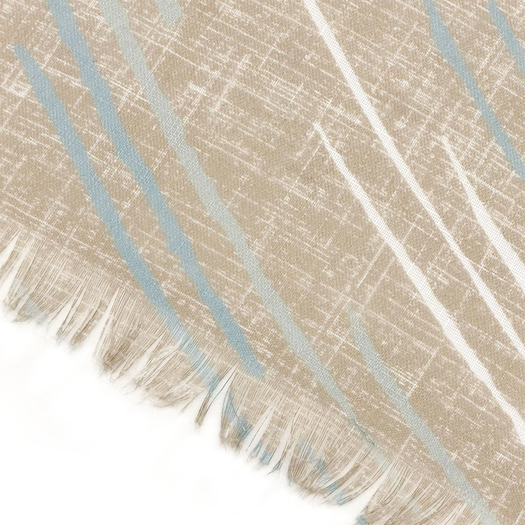Closeup of the Kilo Hōkū Travel Wrap in Taupe With Light Blue lines and a Frayed Edge