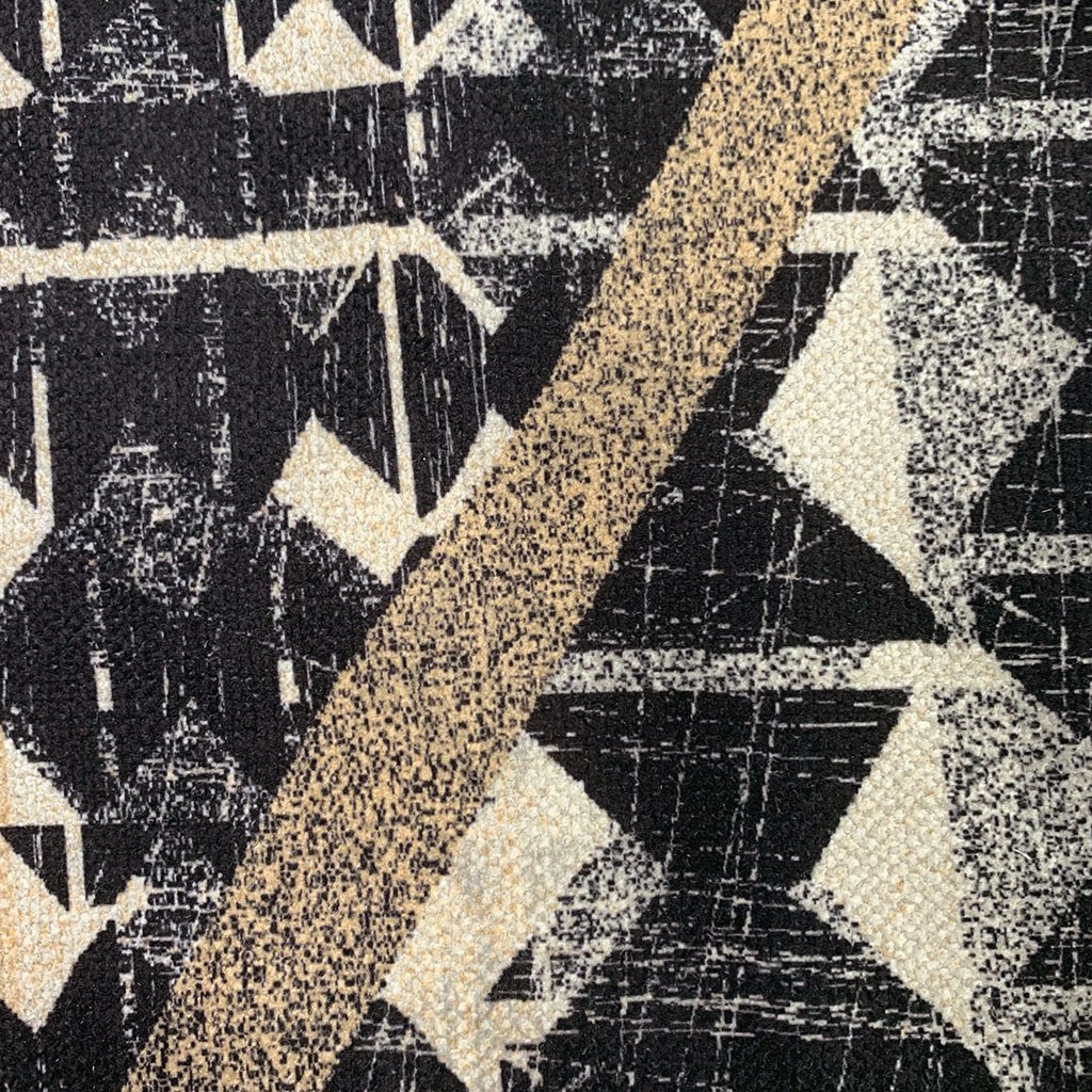 close up of decorative kipola throw flatlay of dark navy and white Hawaiian pattern