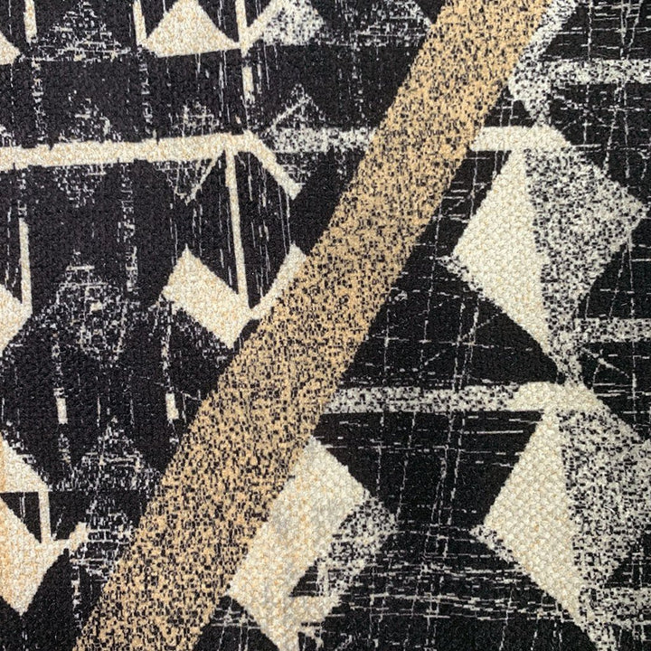 close up of decorative kipola throw flatlay of dark navy and white Hawaiian pattern