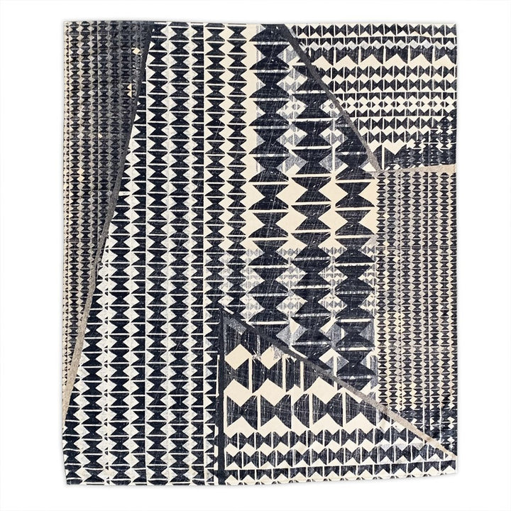 decorative kipola throw flatlay of dark navy and white Hawaiian pattern