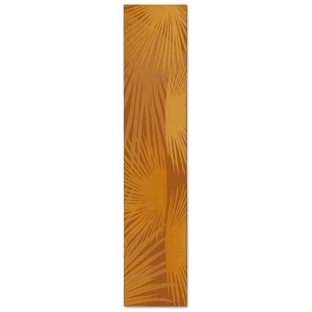 Pumpkin Loulu Palm Table Runner with tonal golden fan-palm fronds, shown full length on a white background