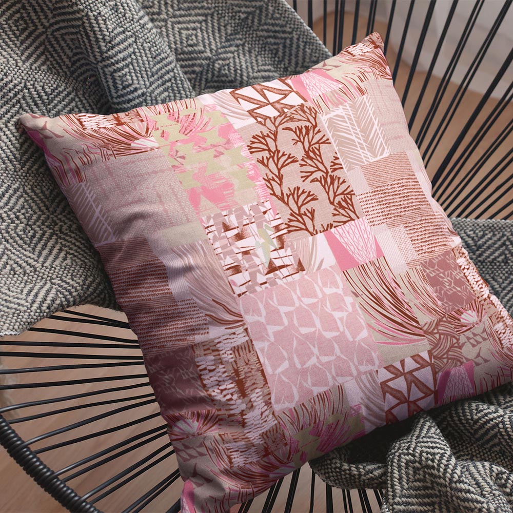 Pink Color Maui Strong Square Pillowcase Set On a Throw Blanket on a Wire Lounge Chair