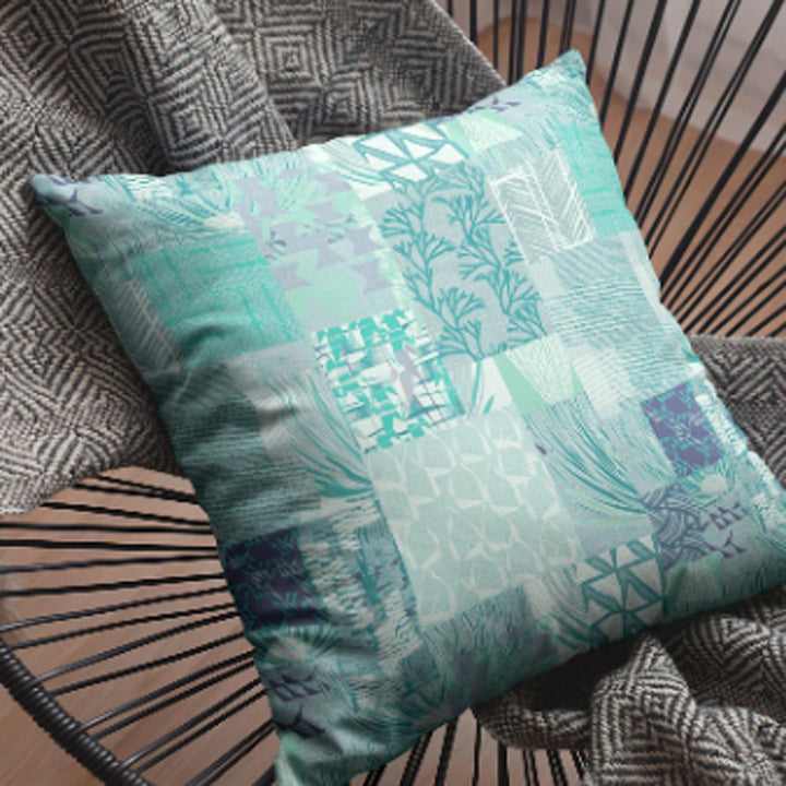 Teal Blue Color Maui Strong Square Pillowcase Set On a Throw Blanket on a Wire Lounge Chair