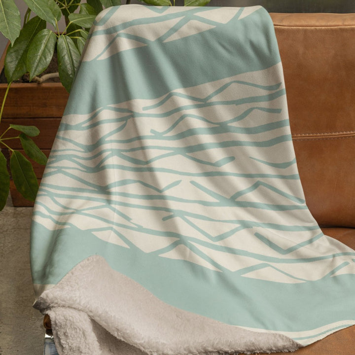 niho kila seafoam cozy throw on chair 