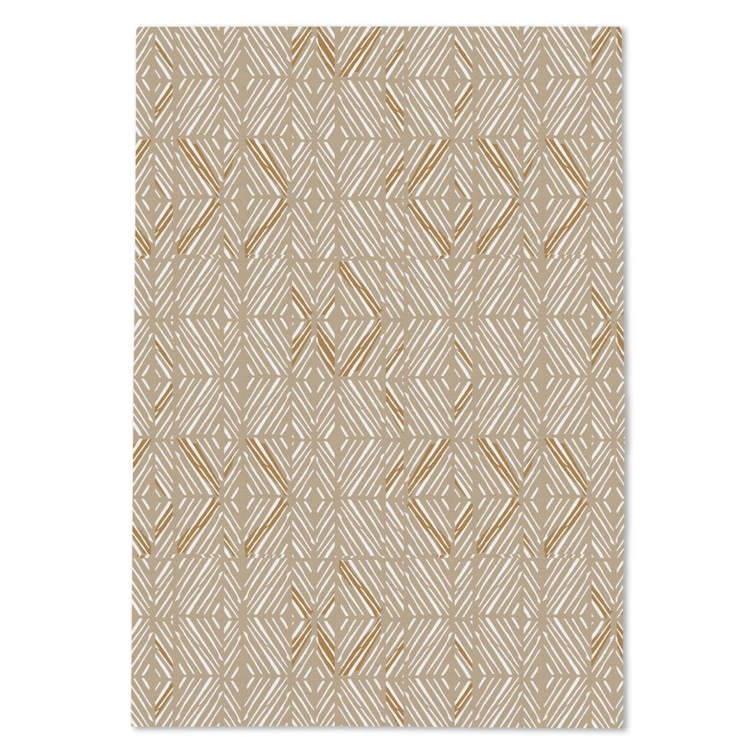 Beige and brown geometric patterned tea towel on a white background