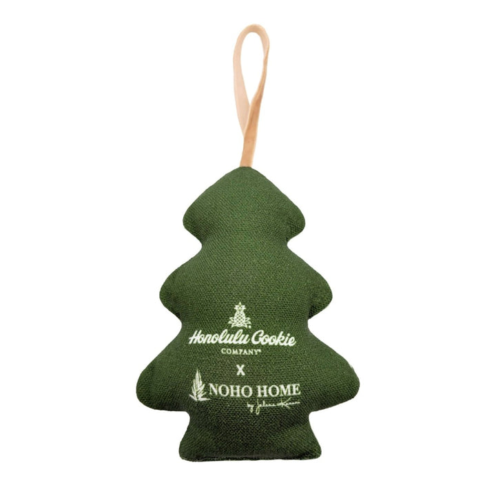 Back of the mini tree ornament with the Honolulu Cookie Company x NOHO HOME logos