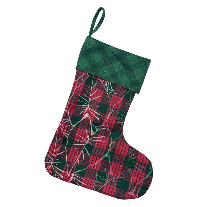 Christmas stocking with red and green plaid pattern on a white background