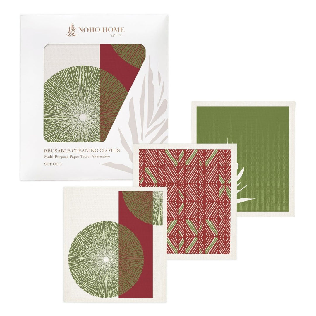 A set of three reusable cleaning cloths with red and green Hawaiian designs, displayed in an open package.