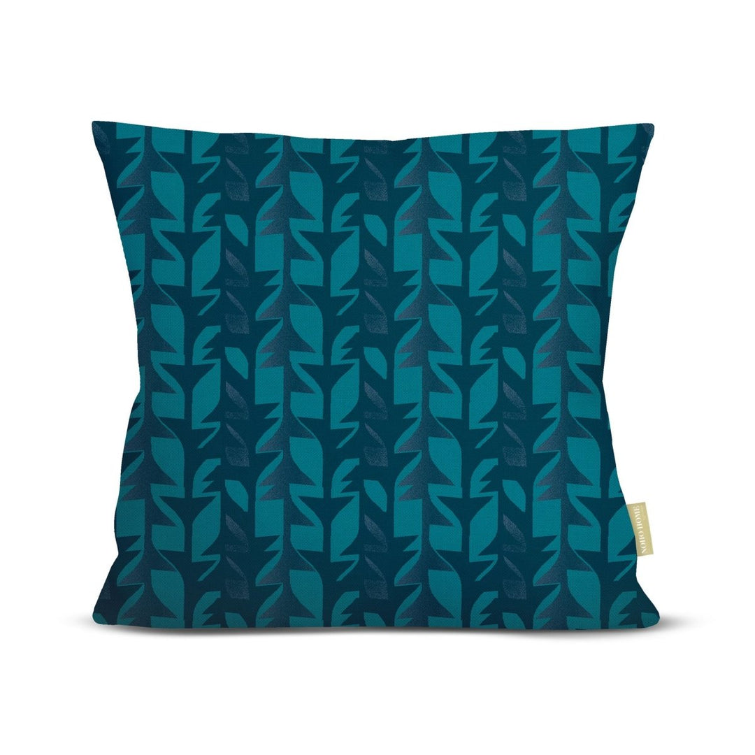 Decorative pillow with blue geometric pattern on a white background
