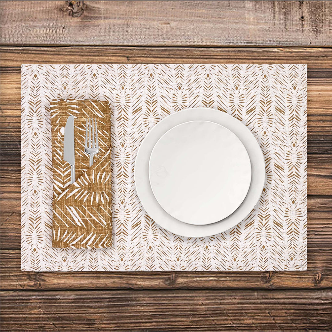 Gold Hulu Napkin Set Folded With Utensils Tucked In On a Hawaiian Print Placemat