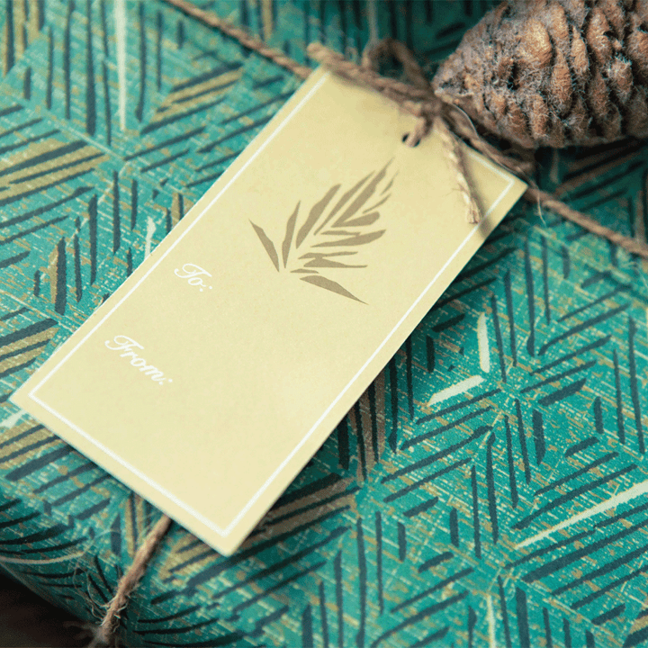 ʻAkahi & Lauaʻe Wrapping Paper Hanging Gift Tag On a Present