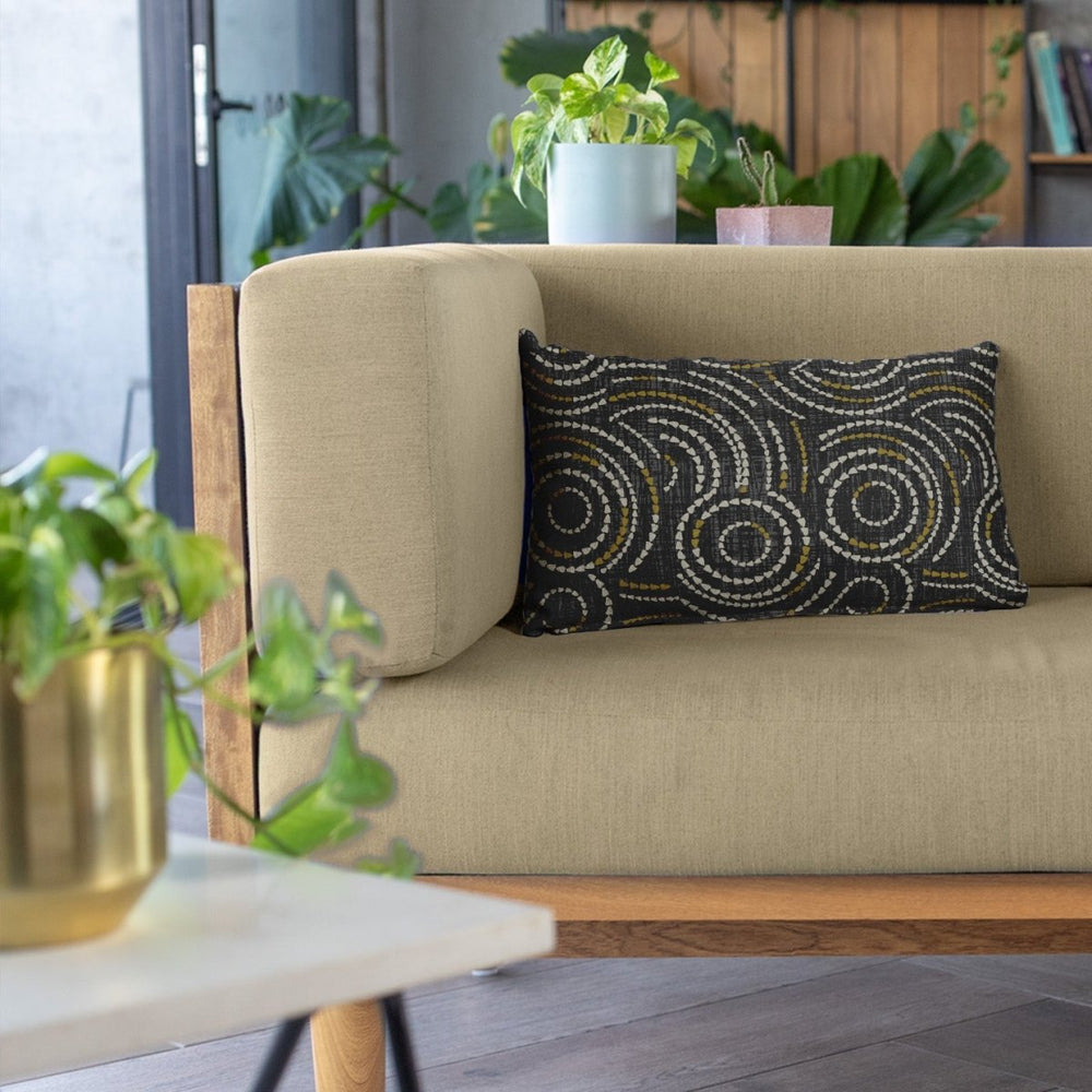 Ivory and Blue Crown Flower Lumbar Pillowcase On a Biege Couch